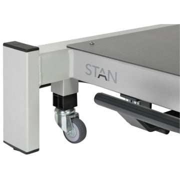 Rolling lift system for therapy table STAN